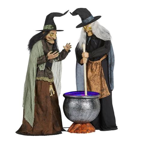 Witch stirring bubbling cauldron animatronic